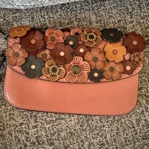Coach Pink Leather Clutch with Floral Accents